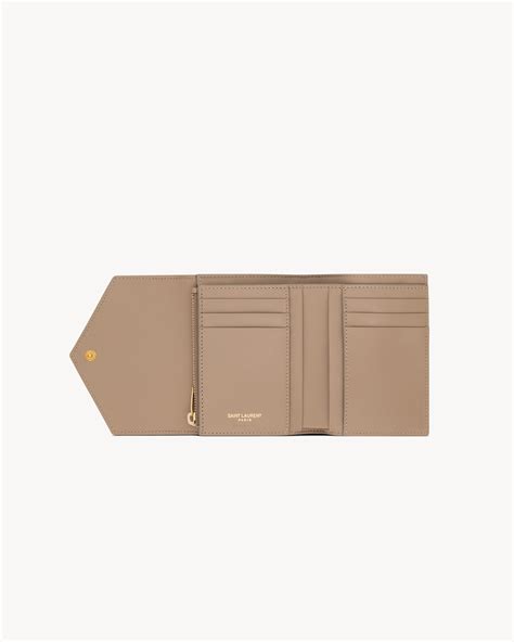 CASSANDRE MATELASSÉ compact tri fold wallet in LAMBSKIN